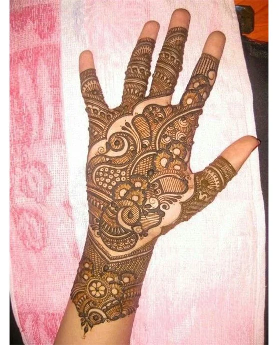 Filigree Vine Extension Blending Into Front Hand Mehndi Design